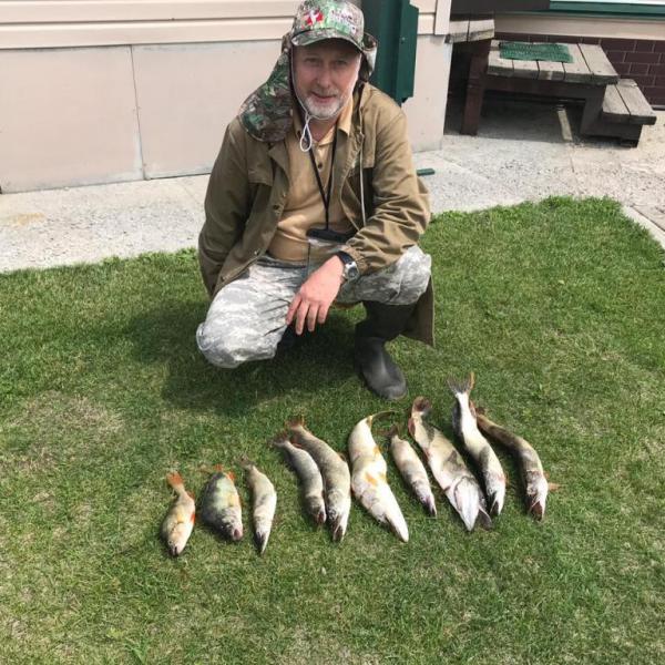 Фото рыбака и улова после рыбалки в 2019г в дом рыбака Кордон
